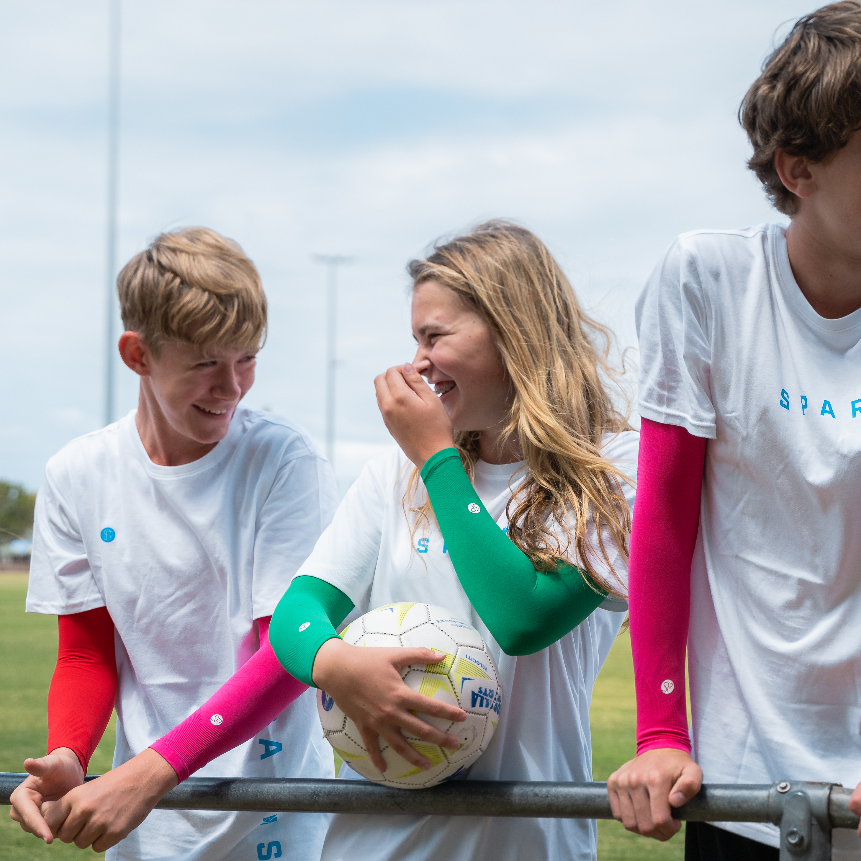 Image of soccer players wearing the SParms Every Day Sleeves for Kids.