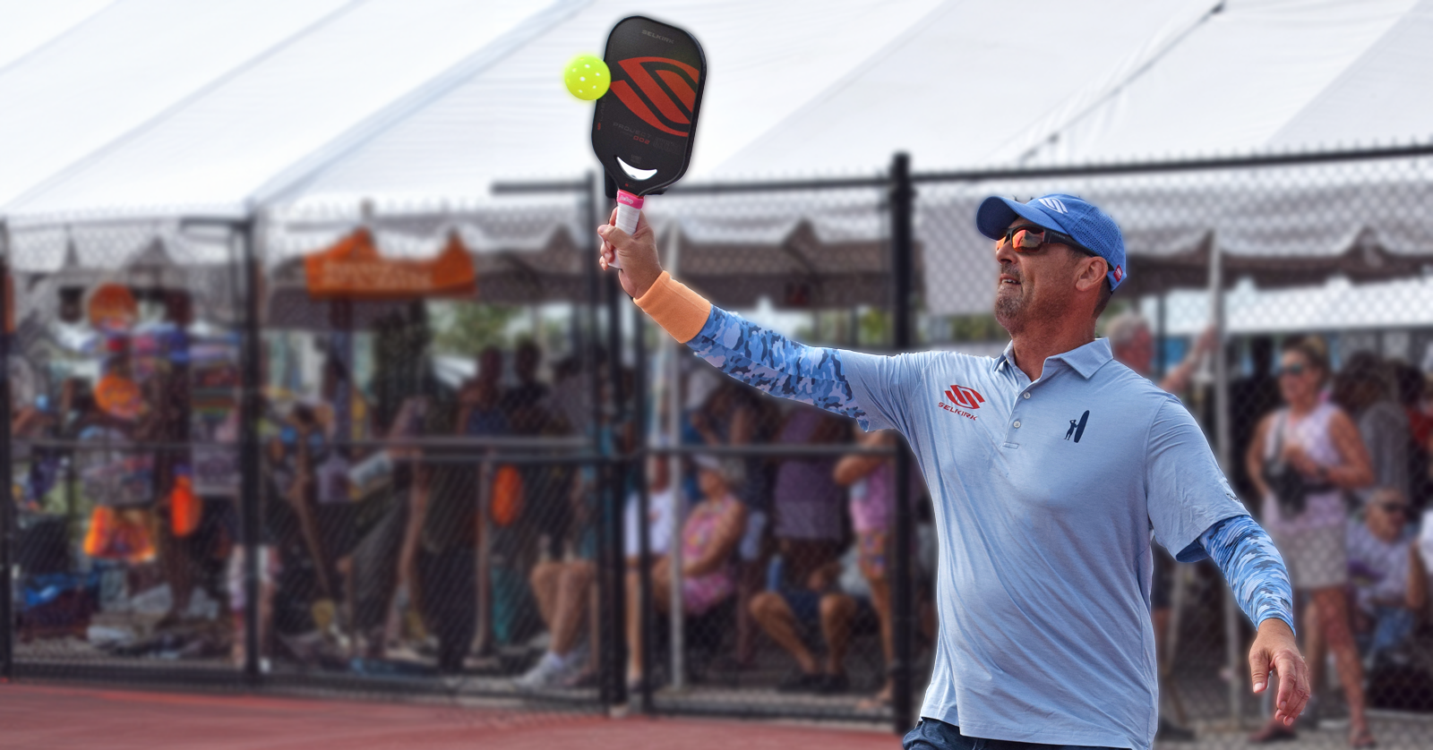 Image of a pickleball pro wearing camo SParms sun sleeves.